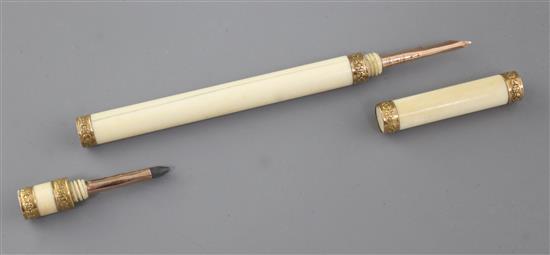 A rare 19th century French gold mounted marine ivory combination pen/pencil, 5.25in., housed in a red leather case